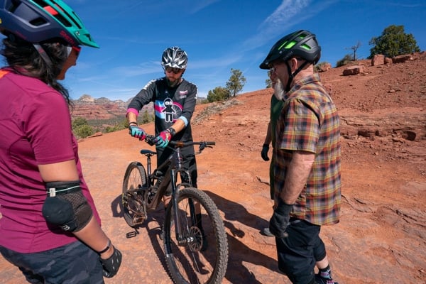 Riders learning about shifting gears during a skills clinic.