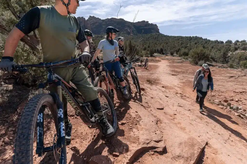 mountain bikers giving hikers the right of way