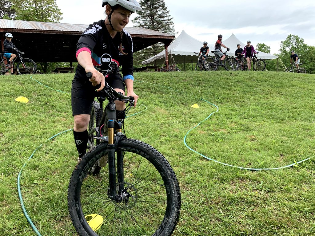 A woman practicing during a skills clinic